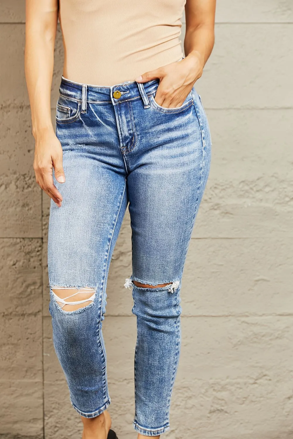 Mid Rise Distressed Skinny Jeans